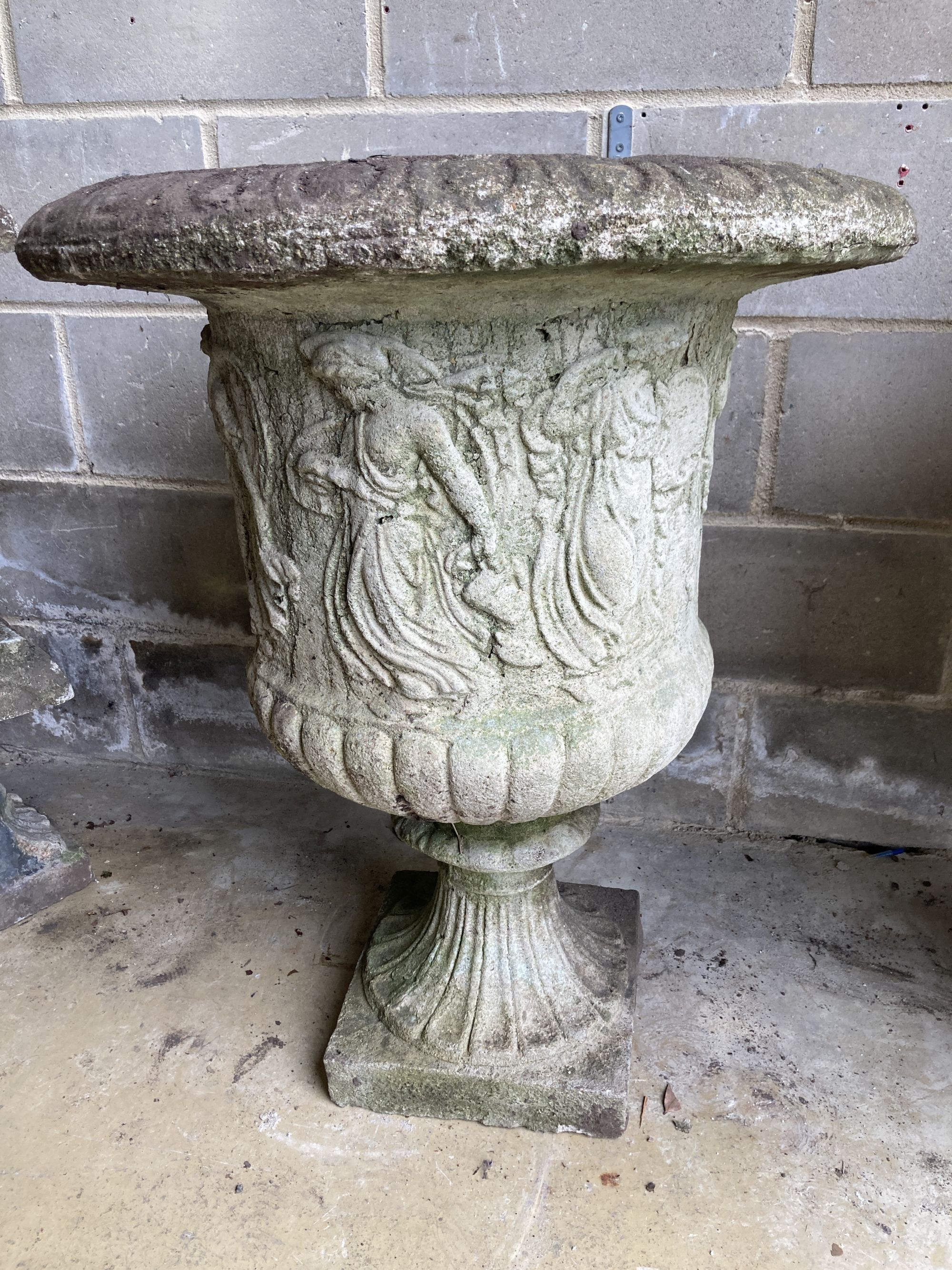 A near pair of reconstituted stone campana garden urns, larger 66cm diameter, height 85cm